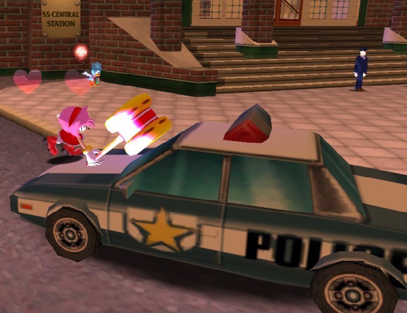 Screenshot of Amy from Sonic Adventure hitting a police car